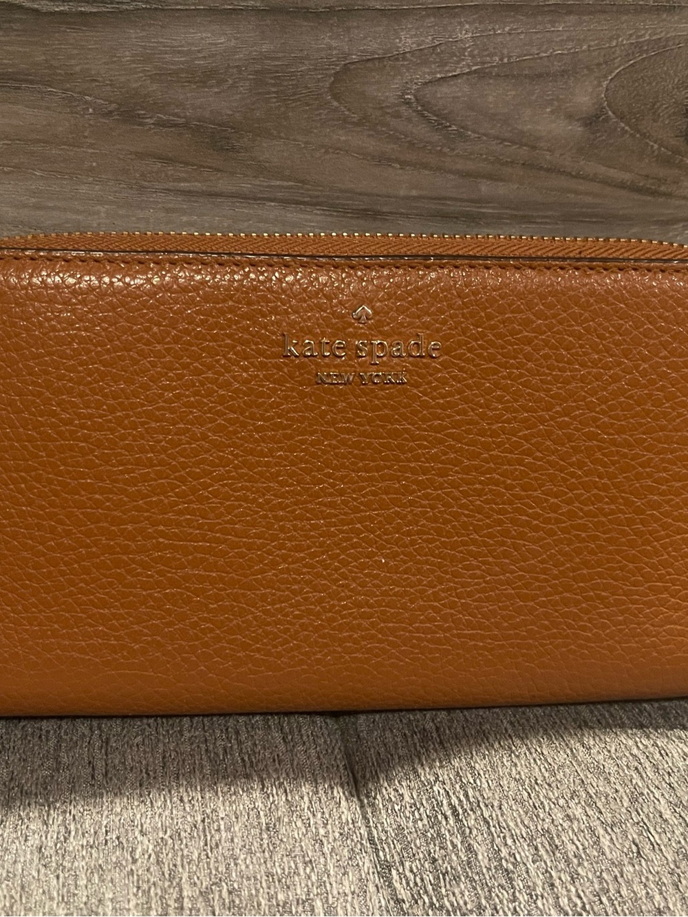 kate spade Pebbled Leather Zip Wallet in Cognac